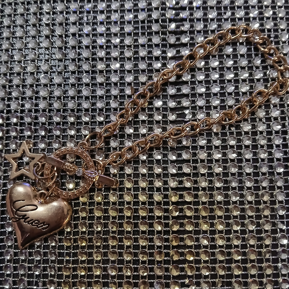 Guess Gold Star and Heart Charm Bracelet